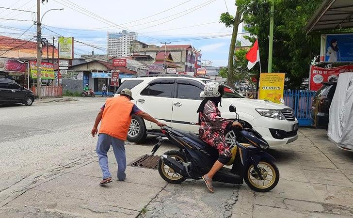 2025-03-22-1762Jukir nakal.jpg